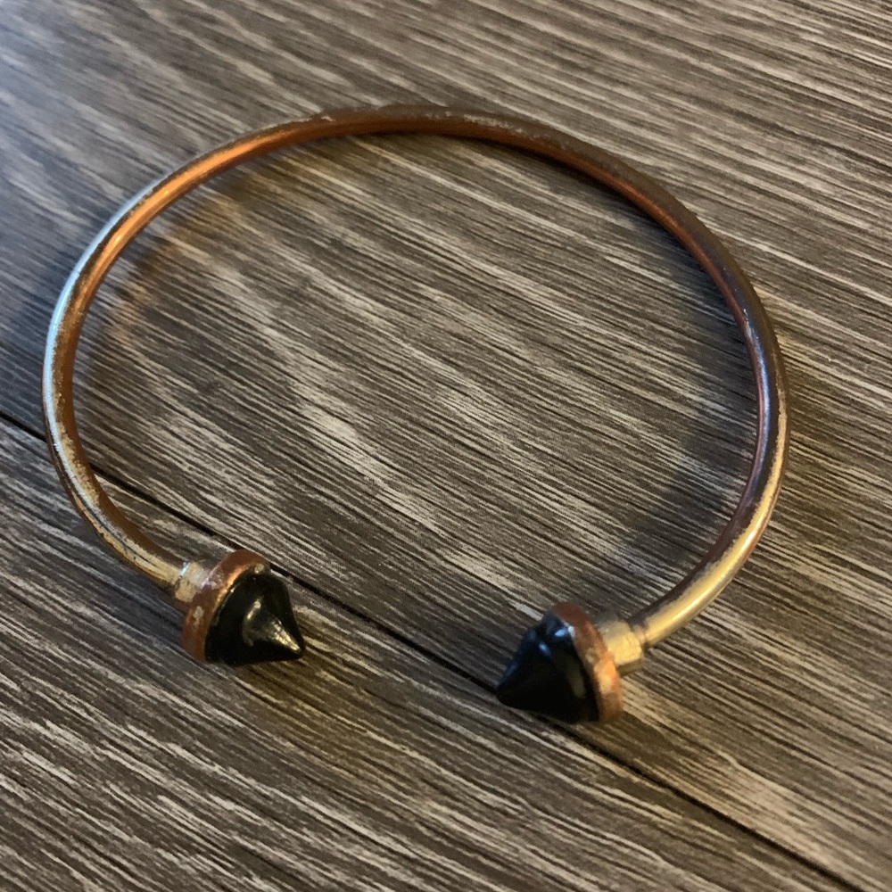Gently used brass bangle
